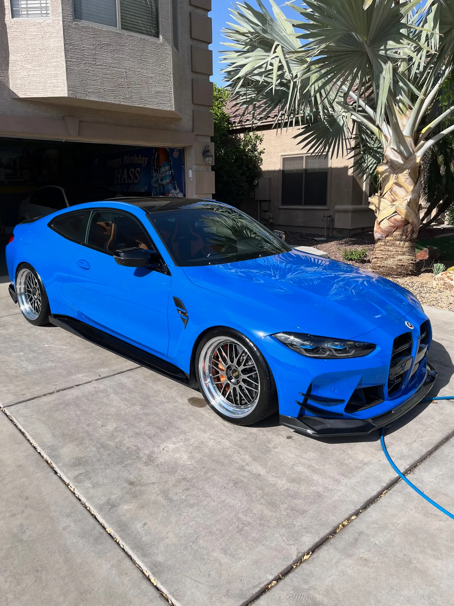 Blue BMW M4 with a deep gloss after a full exterior detail